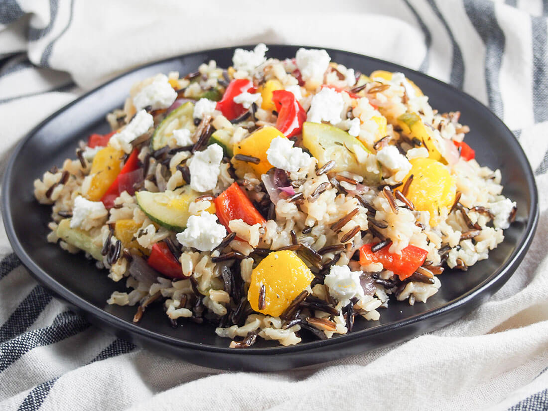 acorn squash wild rice salad acorn squash wild rice salad on black plate