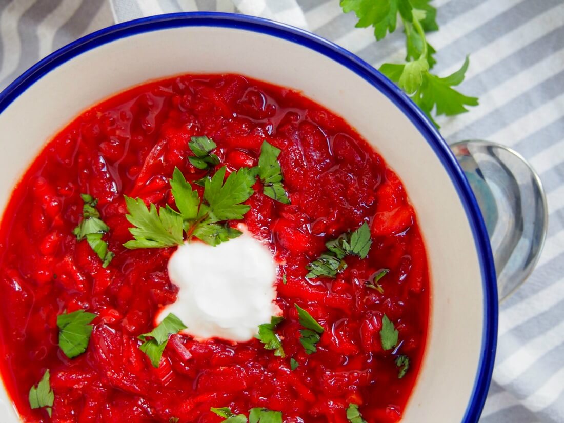 borscht is a wonderfully comforting Russia beet soup partial view of bowl of borscht