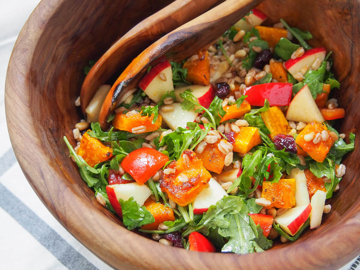 butternut squash farro salad with apple side view of bowl of butternut squash farro salad