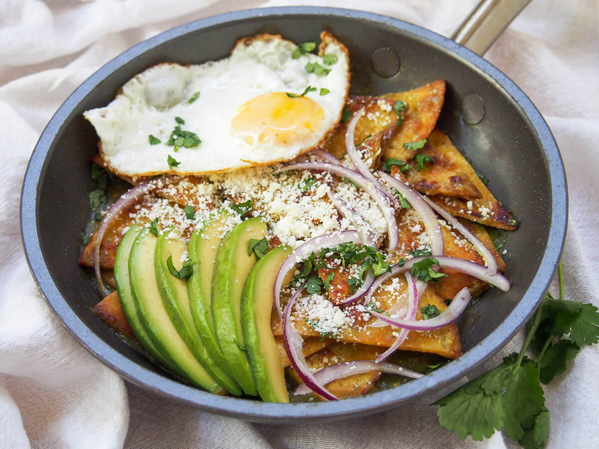 chilaquiles verdes is a delicious and easy brunch chilaquiles verdes topped with avocado and fried egg