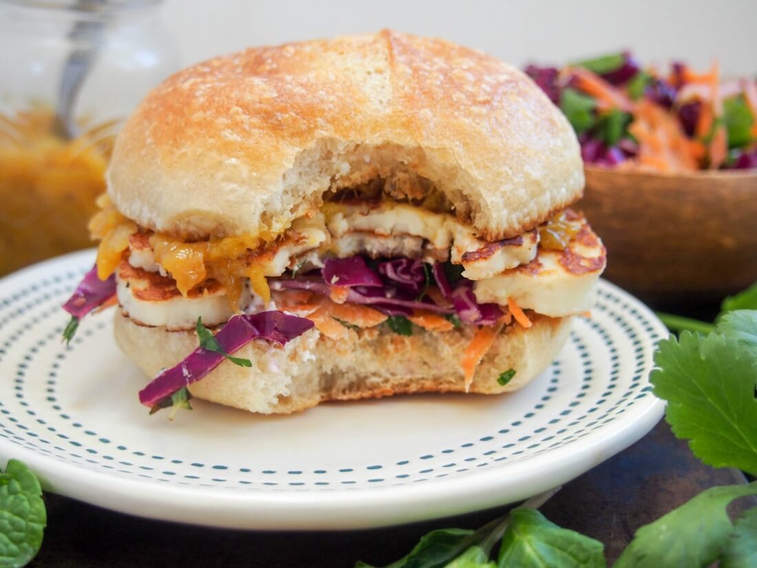 This halloumi burger is easy to made and with a delicious sweet-salty combination of flavors. It makes a great lunch, light meal and a tasty vegetarian option. halloumi burger with bite taken out of it