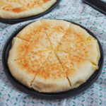 whole imeruli khachapuri on plate