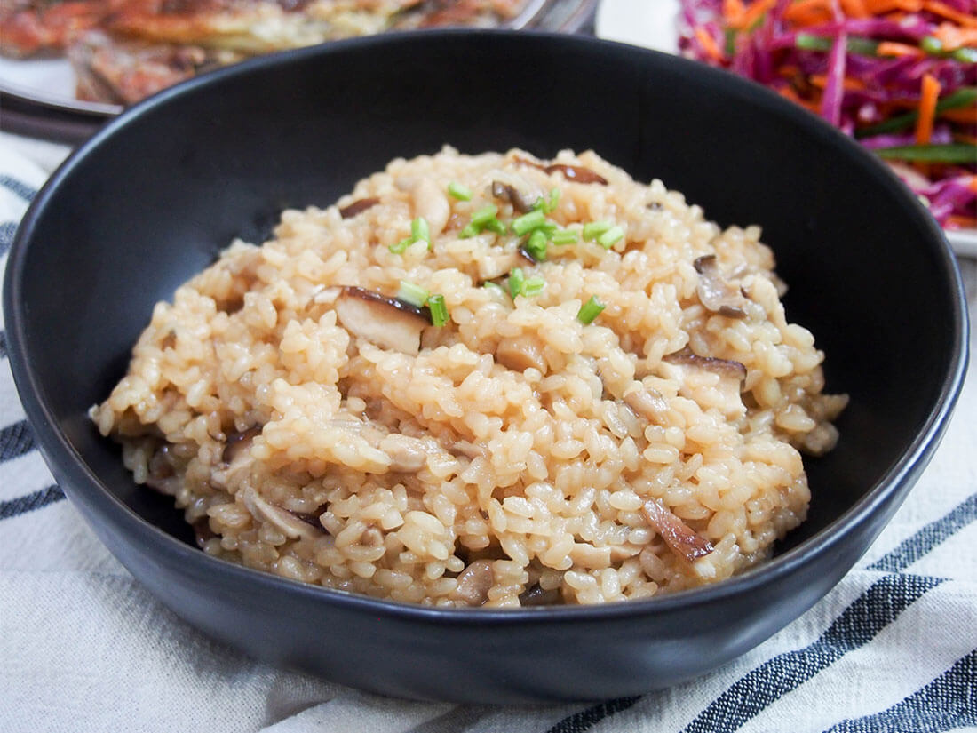 You'll be amazed at how the simple seasonings in this Japanese mushroom rice add so much umami, earthy, delicious flavor. This easy side dish works so well alongside both Asian and many other meals. Japanese mushroom rice (kinoko gohan) in bowl
