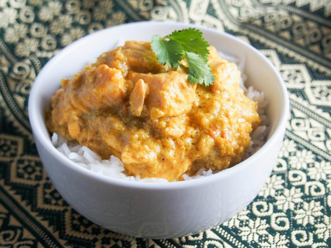 This kid-friendly salmon curry has lots of flavor without the heat - perfect for little ones and grown ups alike. Plus it takes no time to cook and so is the perfect dinner for busy nights. Kid-friendly salmon curry in bowl over rice