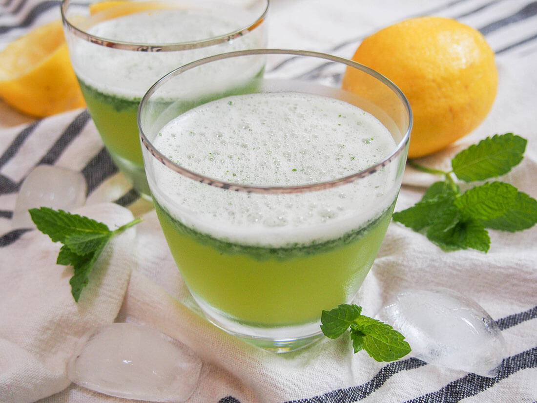 Limonana is a Middle Eastern mint lemonade which comes together in no time. The mint makes it extra refreshing - just what a warm summer's day needs. limonona (mint lemonade) in glass