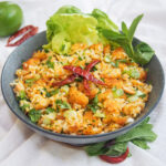 bowl of nam khao Lao crispy rice salad