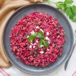 plate of raw beet quinoa salad from overhead