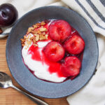bowl of stewed plums and yogurt